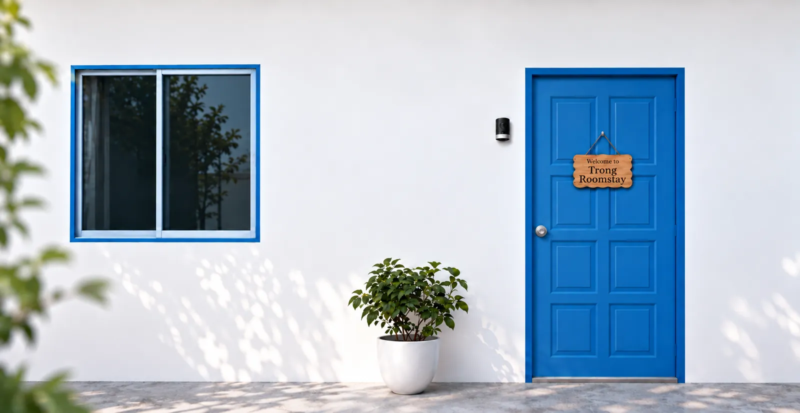 Trong Roomstay open for guests — blue door entrance